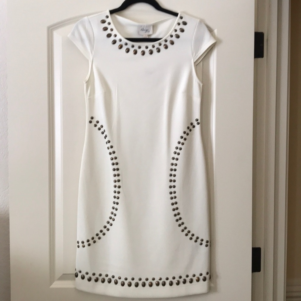 Ivory dress with bronze embellishments